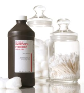 Hydrogen Peroxide bottle with cotton swabs